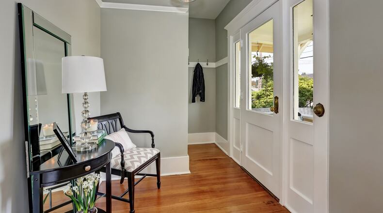 Make sure you have solid organizational systems in mind to keep clutter to a minimum and choose thoughtful furniture and accessories that will keep paths clear. (Dreamstime)