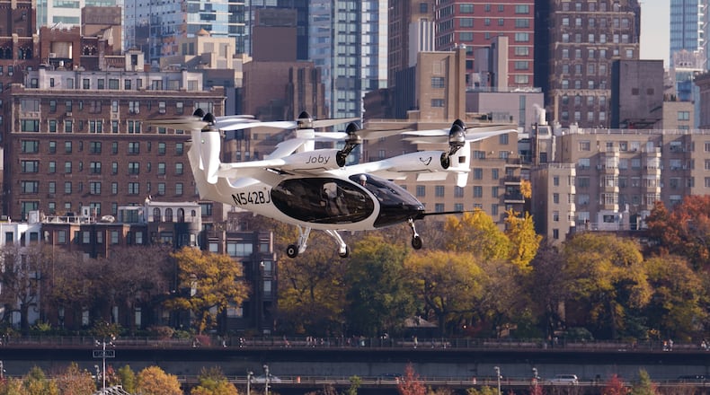 Joby’s electric air taxi in the skies above New York City, piloted by James “Buddy” Denham. Joby Aviation Image
