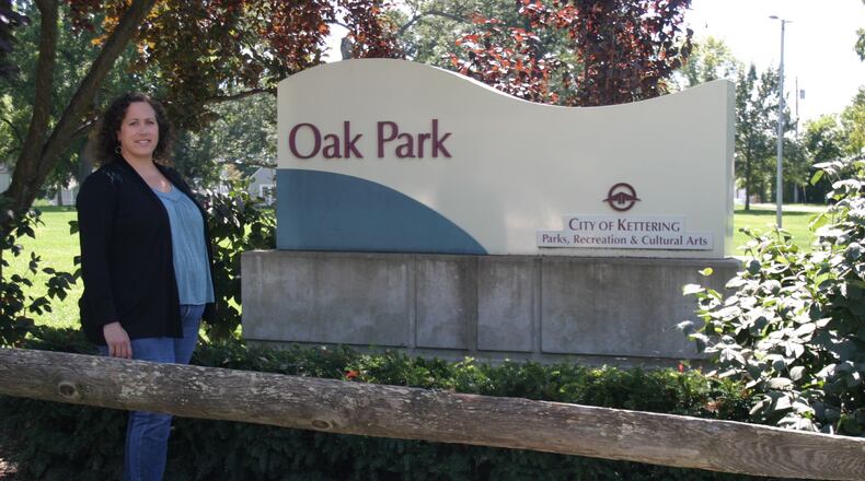 Kettering resident and ArtLocal Art Selection Committee member Jackie Griffin by the entrance to her neighborhood park, Oak Park. PAMELA DILLON/CONTRIBUTED