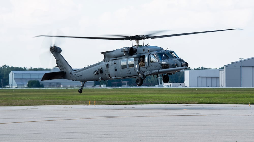 An HH-60W Jolly Green II helicopter lands at Wright-Patterson Air Force Base on Sept. 1 for an overnight stay while en route from Moody AFB, Georgia, to Kirtland AFB, New Mexico in 2021. U.S. AIR FORCE PHOTO/WESLEY FARNSWORTH