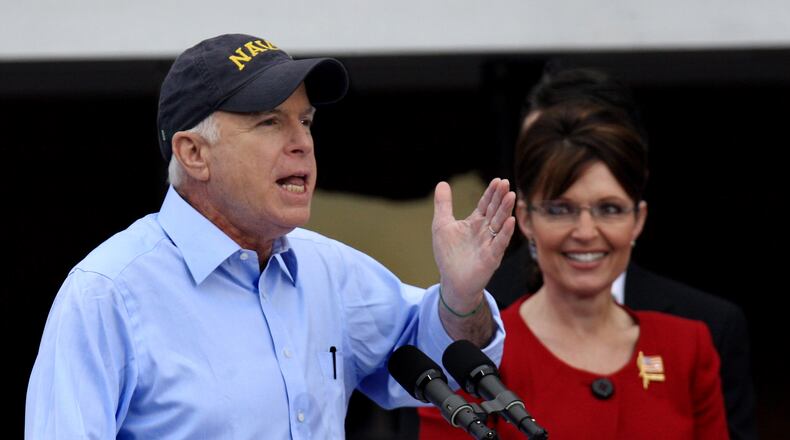 Presidential candidate John McCain speaks next to running mate Sarah Palin on Broadway Avenue in downtown Lebanon on Sept. 9, 2008, in front of thousands of people outside the Golden Lamb. Staff photo by Nick Daggy