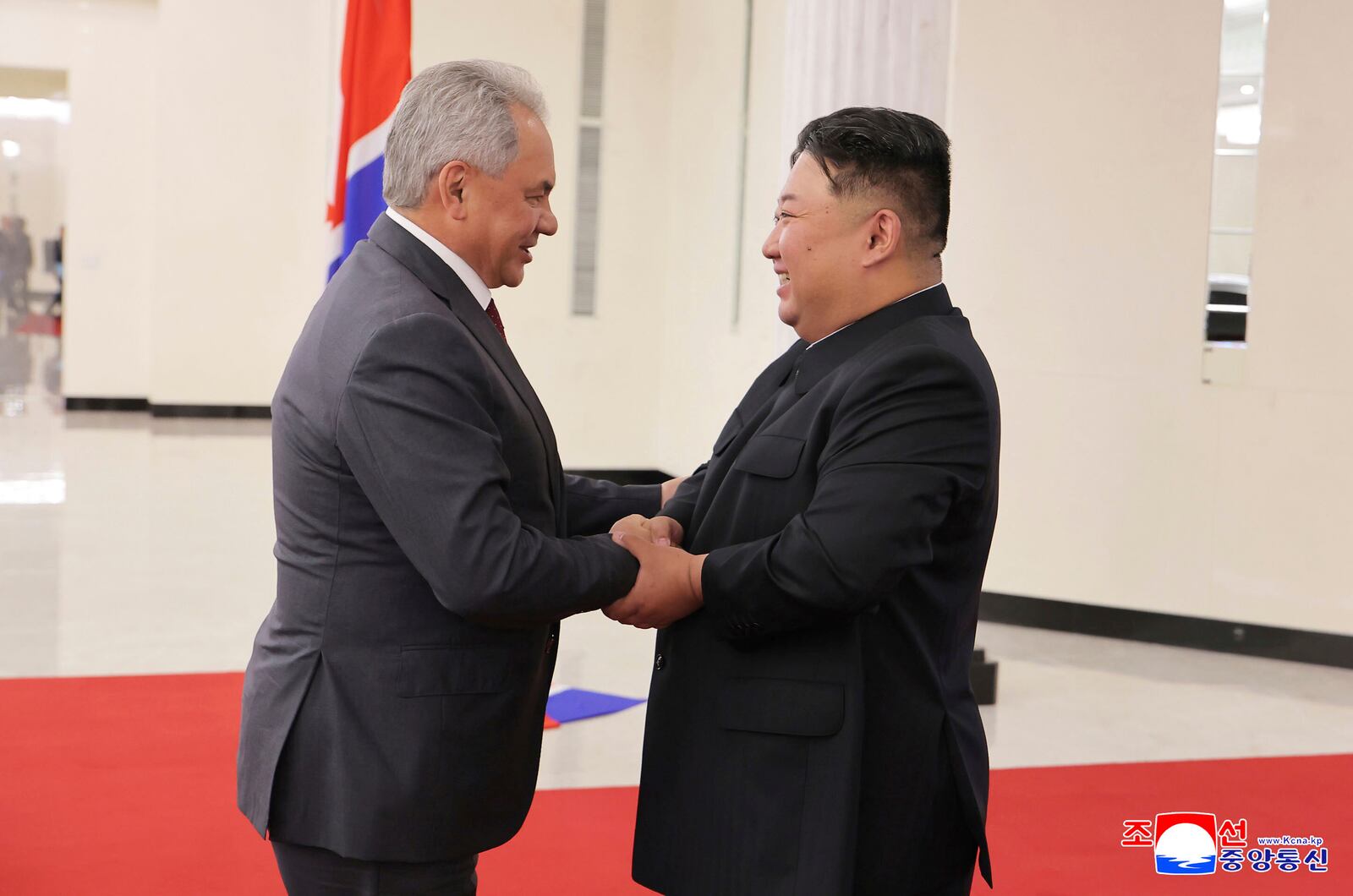In this photo provided by the North Korean government, North Korean leader Kim Jong Un, right, shakes hands with Russian Security Council Secretary Sergei Shoigu, left, at the headquarters of the ruling Workers' Party in Pyongyang, North Korea, Tuesday, June 17, 2025. Independent journalists were not given access to cover the event depicted in this image distributed by the North Korean government. The content of this image is as provided and cannot be independently verified. Korean language watermark on image as provided by source reads: "KCNA" which is the abbreviation for Korean Central News Agency. (Korean Central News Agency/Korea News Service via AP)