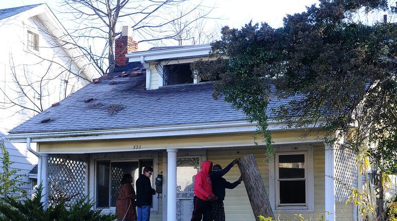 One person was hospitalized after firefighters responded to a house fire in the 800 block of Dow Street Tuesday, Nov. 14, 2023. MARSHALL GORBY\STAFF.