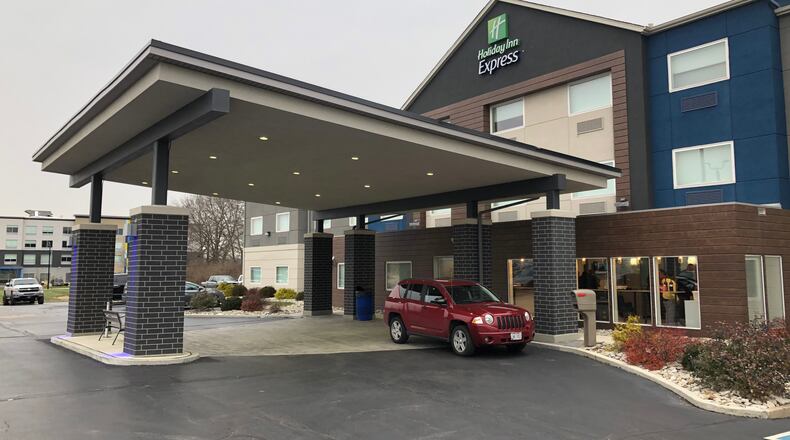 The Holiday Inn Express and Suites, 120 Senate Drive, Monroe, recently held its ribbon-cutting to celebrate $2 million in renovations. RICK McCRABB/STAFF