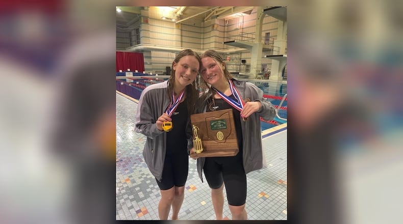Alter freshman Emma Tenhundfeld (left) and her sister Ava (right), a junior, are both state-bound as the Division II state swimming and diving tournaments get underway in Canton - Contributed