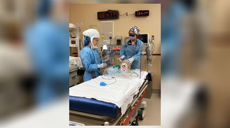 Physicians in the Atrium Medical Center emergency department have started using an intubation box when treating patients in respiratory distress such as those experiencing symptoms of coronavirus, or those confirmed positive with COVID-19. The box was designed by an AMC physician and her husband and manufactured by a Franklin company. SUBMITTED PHOTO