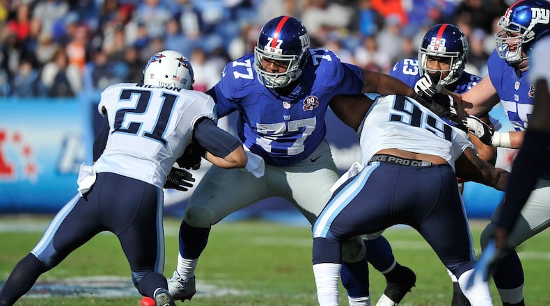 NASHVILLE, TN - DECEMBER 07: John Jerry #77 of the New York Giants plays against the Tennessee Titans at LP Field on December 7, 2014 in Nashville, Tennessee. (Photo by Frederick Breedon/Getty Images)