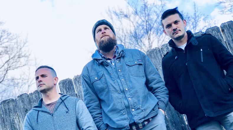 High school friends, (left to right) Robert Grote, Aaron Zurn and Ben Willis, recently reformed their high school band, Stailer, which is helping one of its members deal with memory loss and Post-Traumatic Stress Disorder. (Not pictured, Nick Kostoff) CONTRIBUTED