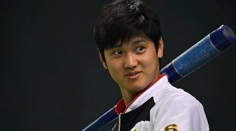 TOKYO, JAPAN - NOVEMBER 12: Shohei Ohtani #16 of Japan is seen during the warm-up ahead of the international friendly match between Japan and Netherlands at the Tokyo Dome on November 12, 2016 in Tokyo, Japan. (Photo by Masterpress/Getty Images)