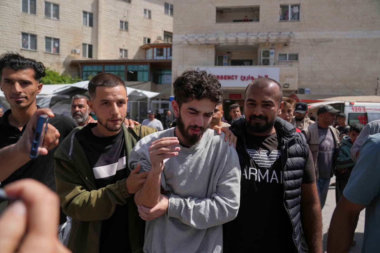 Freed Palestinian prisoner Mohammad Hijazi, who was detain by the Israeli army during its ground operation in the Gaza Strip, arrives at al-Aqsa Hospital in Deir al-Balah, central Gaza, after his release from an Israeli prison, Tuesday, April 29, 2025. (AP Photo/Abdel Kareem Hana)
