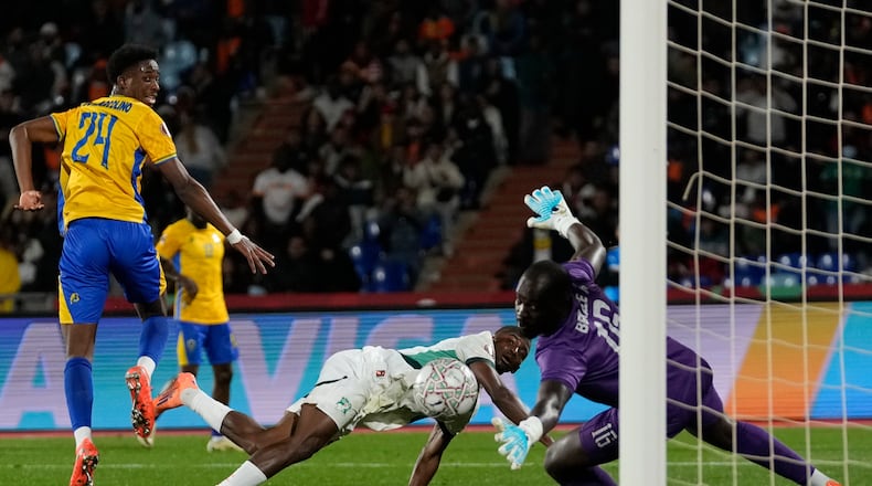 Ivory Coast's Bazoumana Touré scores during the Africa Cup of Nations group F soccer match between Gabon and Ivory Coast, in Marrakech, Morocco, Wednesday, Dec. 31, 2025. (AP Photo/Themba Hadebe)