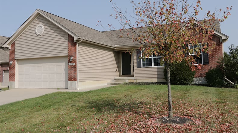 The vinyl-sided ranch home has a full basement with above-ground windows, including an egress window. The split floor plan design with about 2,230 sq. ft. of living space has open social areas, private bedroom wings, and the basement has a finished multipurpose room and half bathroom. CONTRIBUTED PHOTO BY KATHY TYLER