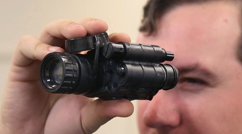 U.S. Army veteran Nick Ripplinger, president of Battle Sight Technologies, a resident business at The Entpreneurs Center. His company produces the MARC IR infrared writing stick, whose writing is visible solely to soldiers wearing night vision goggles, allowing covert written communication. TY GREENLEES / STAFF