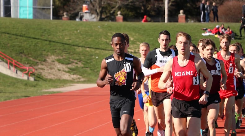 Central State’s Emmanuel Birgen leads the pack during a race at the Miami Duals. CONTRIBUTED