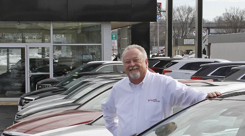 Tim Sheerin, general manager of Springfield Buick-GMC-Cadillac, poses next to some new Cadillacs at the dealership. © 2019 Photograph by Skip Peterson