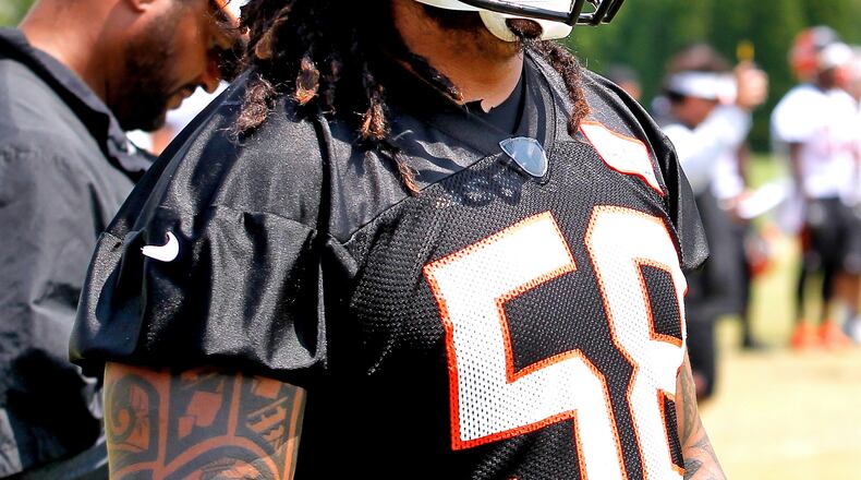 Cincinnati Bengals linebacker Rey Maualuga (58) participates in training camp Tuesday, Aug. 5, 2014, in downtown Cincinnati. NICK DAGGY / STAFF