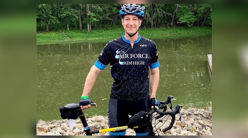 Brig. Gen. Jason Lindsey, program executive officer for Presidential and Executive Airlift, during RAGBRAI, an annual, week-long bicycle ride across the state of Iowa. RAGBRAI tradition is that you begin the ride by dipping your rear tire in the Missouri River or Big Sioux River – western border of Iowa – and end the ride by dipping your front tire in the Mississippi River on eastern border of Iowa. COURTESY PHOTO