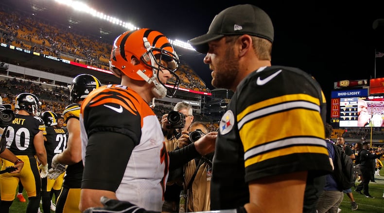 PITTSBURGH, PA - OCTOBER 22: Ben Roethlisberger #7 of the Pittsburgh Steelers shakes hands with Andy Dalton #14 of the Cincinnati Bengals at the conclusion of the Pittsburgh Steelers 29-14 win over the Cincinnati Bengals at Heinz Field on October 22, 2017 in Pittsburgh, Pennsylvania. (Photo by Justin K. Aller/Getty Images)
