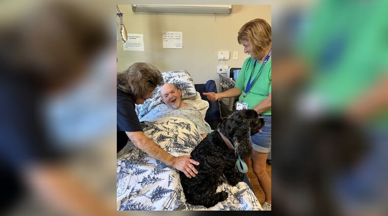 Therapy animal CoCo brings smiles to the faces of residents at Austin Trace Health and Rehabilitation. CONTRIBUTED