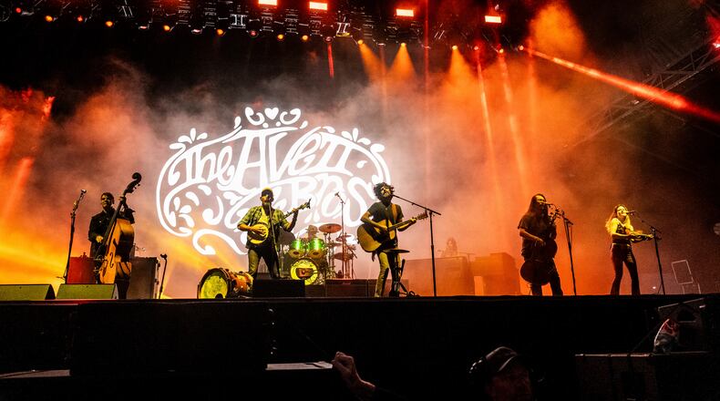 From left, Bob Crawford, Scott Avett, Seth Avett, Joe Kwon, and Tania Elizabeth of The Avett Brothers perform during Bourbon and Beyond Music Festival on Saturday, Sept. 16, 2023, at Kentucky Exposition Center in Louisville, Ky. (Photo by Amy Harris/Invision/AP)