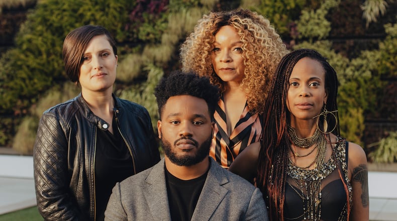 Ryan Coogler with some of his "Black Panther" department heads: from left, the cinematographer Rachel Morrison, the costume designer Ruth E. Carter, and the production designer Hannah Beachler, in Beverly Hills, Calif., Nov. 3, 2018. The crew of Black Panther is unusual among blockbusters for its large number of female department heads. (Rozette Rago/The New York Times)