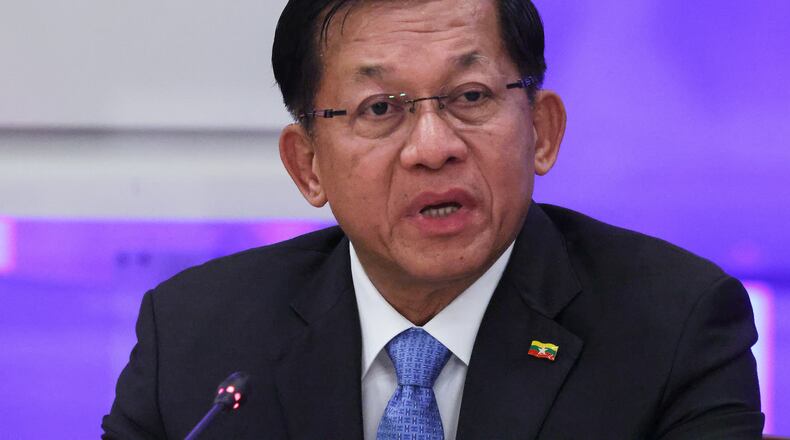 FILE -Myanmar's Military leader Senior Gen. Min Aung Hlaing speaks during a session at the World Atomic Week forum at the Exhibition of Achievements of National Economy (VDNKh) in Moscow, Russia, Sept. 25, 2025. (Evgenia Novozhenina/Pool Photo via AP, File)
