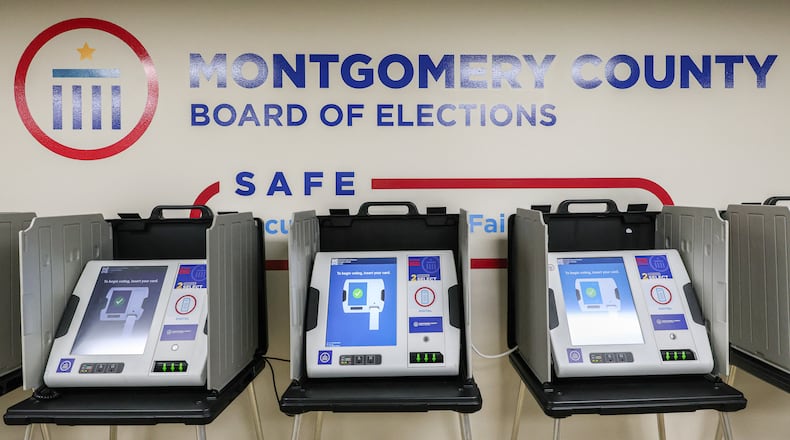 Voting machines are on display at the Montgomery County Board of Elections. BRYANT BILLING / STAFF