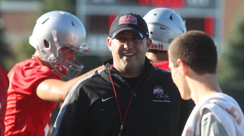 Ohio State wide receivers coach Zach Smith smiles during the first practice for Ohio State freshmen on Sunday, Aug. 7, 2016, at the Woody Hayes Athletic Center in Columbus. David Jablonski/Staff