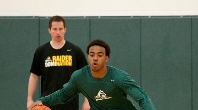 Mark Howell, an incoming Wright State basketball freshman, practices Wednesday under they watch of WSU head coach Billy Donlon. LISA POWELL / STAFF