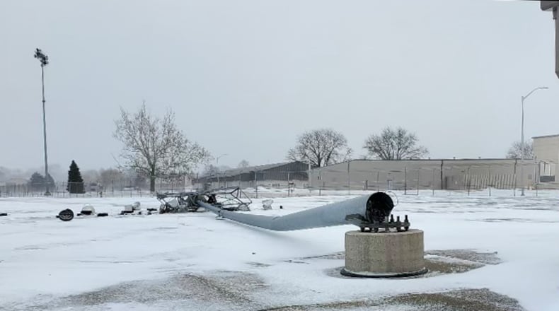 A light pole lays on the ground near Wright-Patterson Air Force Base’s flightline after it was blown over by high winds during a winter storm Dec. 23, 2022. The storm caused nearly $4 million in damage across both areas of the installation. (Contributed photo)