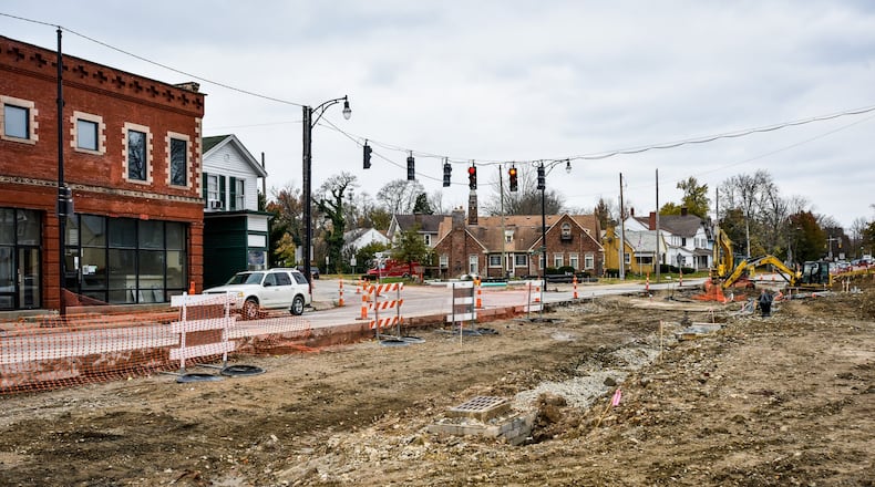 Construction continues on the intersection of Main Street, Millville Avenue and Eaton Avenue in Hamilton. Several properties were purchased by the city to re-align the intersection.