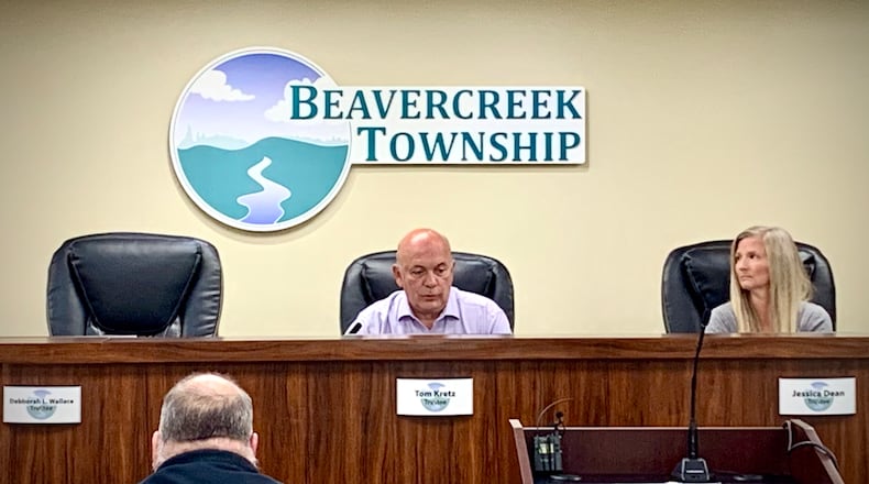 Beavercreek Twp. Trustees Tom Kretz (center) and Jessica Dean (right) vote to censure absent Trustee Debborah Wallace Friday, August 15, 2025, following an investigation into bullying and harassment of township employees. LONDON BISHOP/STAFF