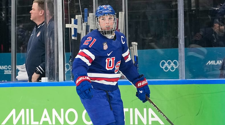 United States' Hilary Knight (21) celebrates after scoring her side's opening goal during a women's ice hockey gold medal game between the United States and Canada at the 2026 Winter Olympics, in Milan, Italy, Thursday, Feb. 19, 2026. (AP Photo/Hassan Ammar)