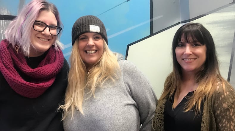 Mindy Finch(Center) is selling Derailed: A Hair Salon to Ali Matta (right) and Drake Myers (left). Photo Amelia Robinson