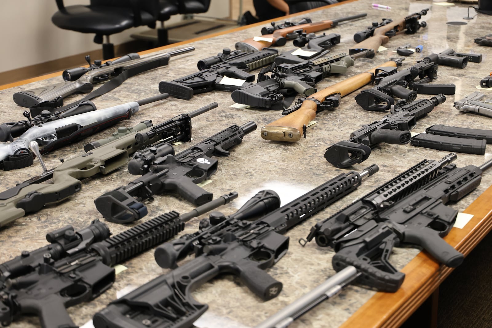 Several guns and ammunition recovered from a house in Harrison Twp. over the summer.

CONTRIBUTED / MONTGOMERY COUNTY SHERIFF'S OFFICE.