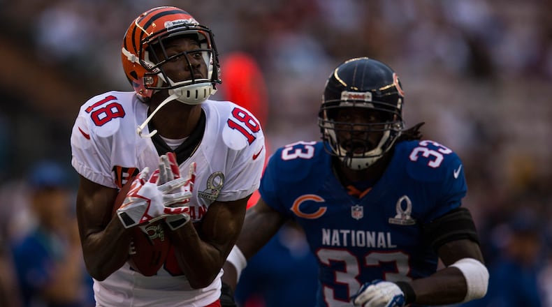 HONOLULU, HI - JANUARY 27: A.J. Green #18 of the AFC’s Cincinnati Bengals catches a pass over Charles Tillman #33 of the NFC’s Chicago Bears during the 2013 AFC-NFC Pro Bowl on January 27 , 2013 at Aloha Stadium in Honolulu, Hawaii. (Photo by Kent Nishimura/Getty Images)