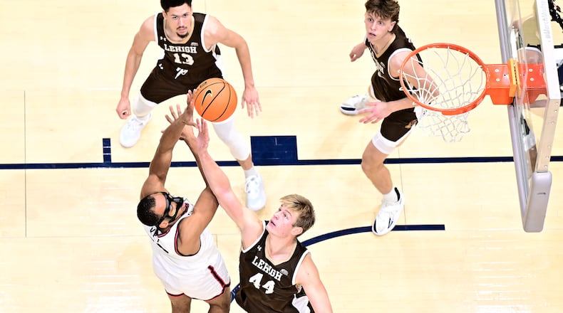 Dayton's Zed Key shoots over Lehigh's Tommy Conniff during Saturday's game at UD Arena. Erik Schelkun/UD Athletics photo