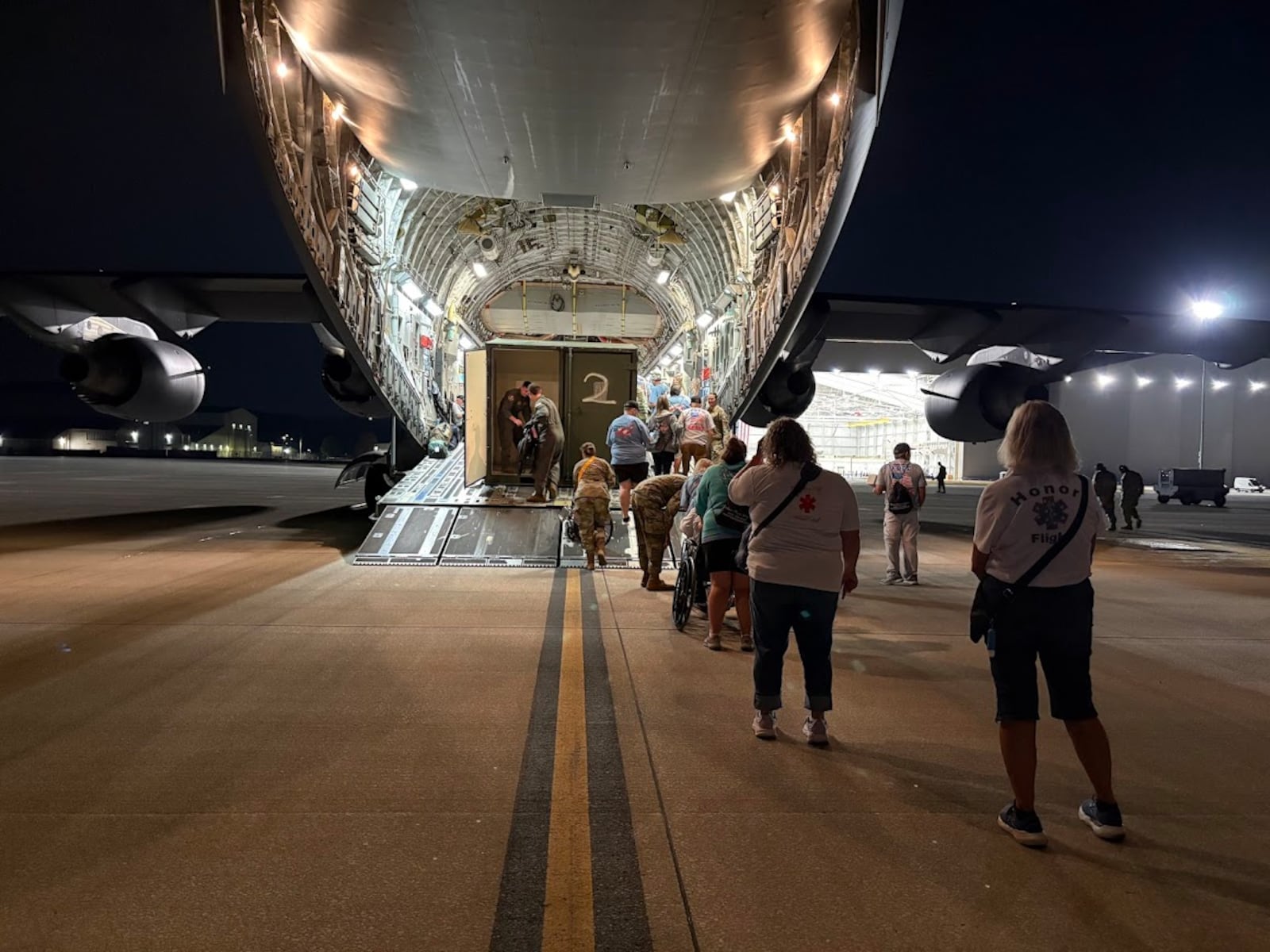 Veterans and guardians board a C-17 at Wright-Patterson Air Force Base Sunday Sept. 21, 2025 for a one-day tour of Washington, D.C. war memorials. THOMAS GNAU/STAFF