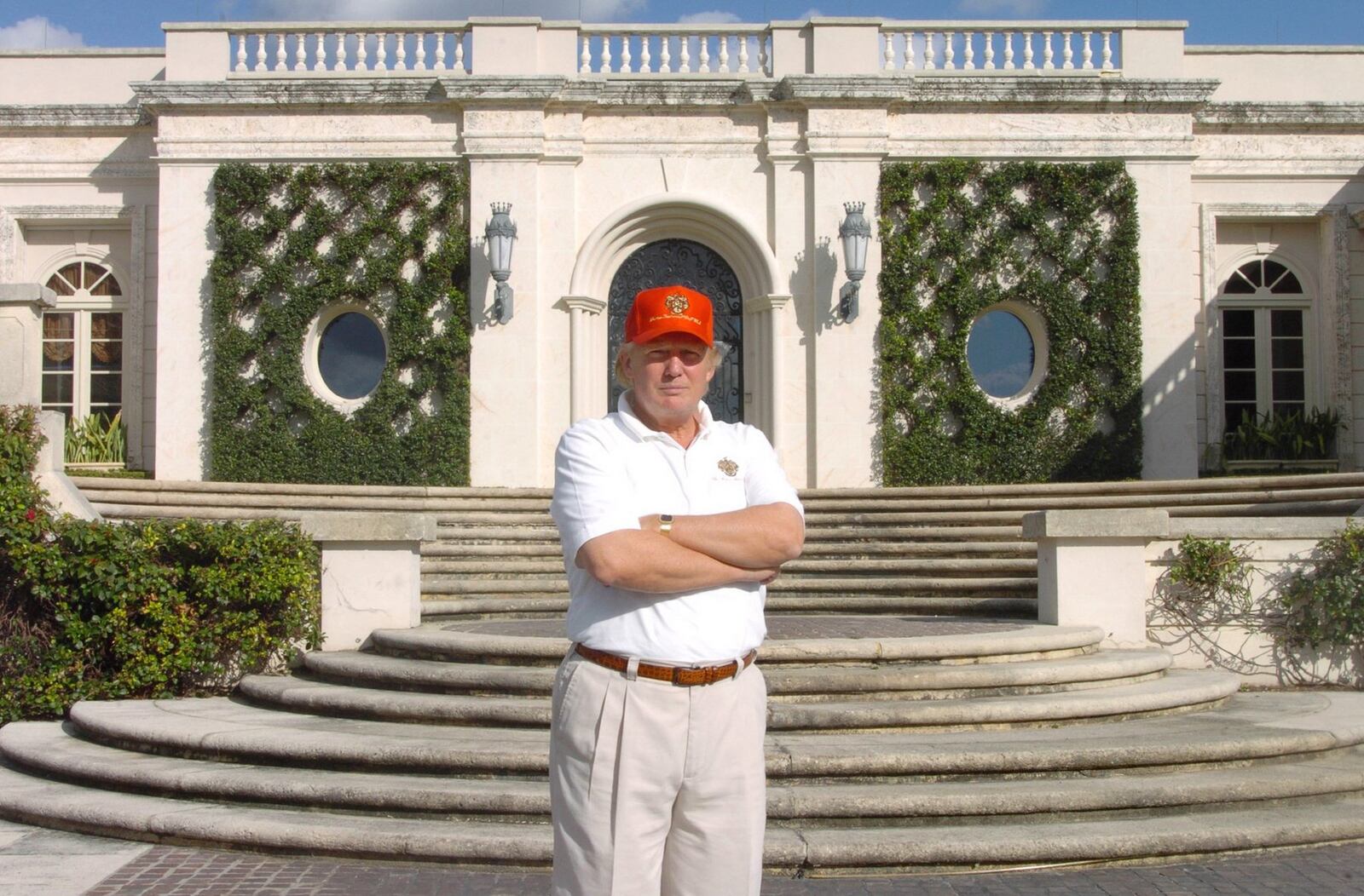 Photographed in 2005, now-President Donald Trump stands in front of 515 N. County Road, the estate he bought at auction for about $41 million, renovated and then sold in 2008 at a recorded $95 million. That price set a sales record that still stands in Palm Beach County. (Jeffrey Langlois / Palm Beach Daily News)