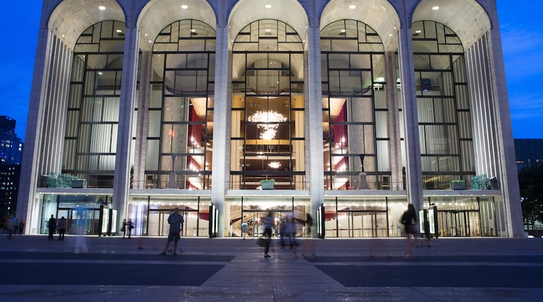 FILE - The Metropolitan Opera house at Lincoln Center appears on Aug. 1, 2014, in New York. (AP Photo/John Minchillo, File)