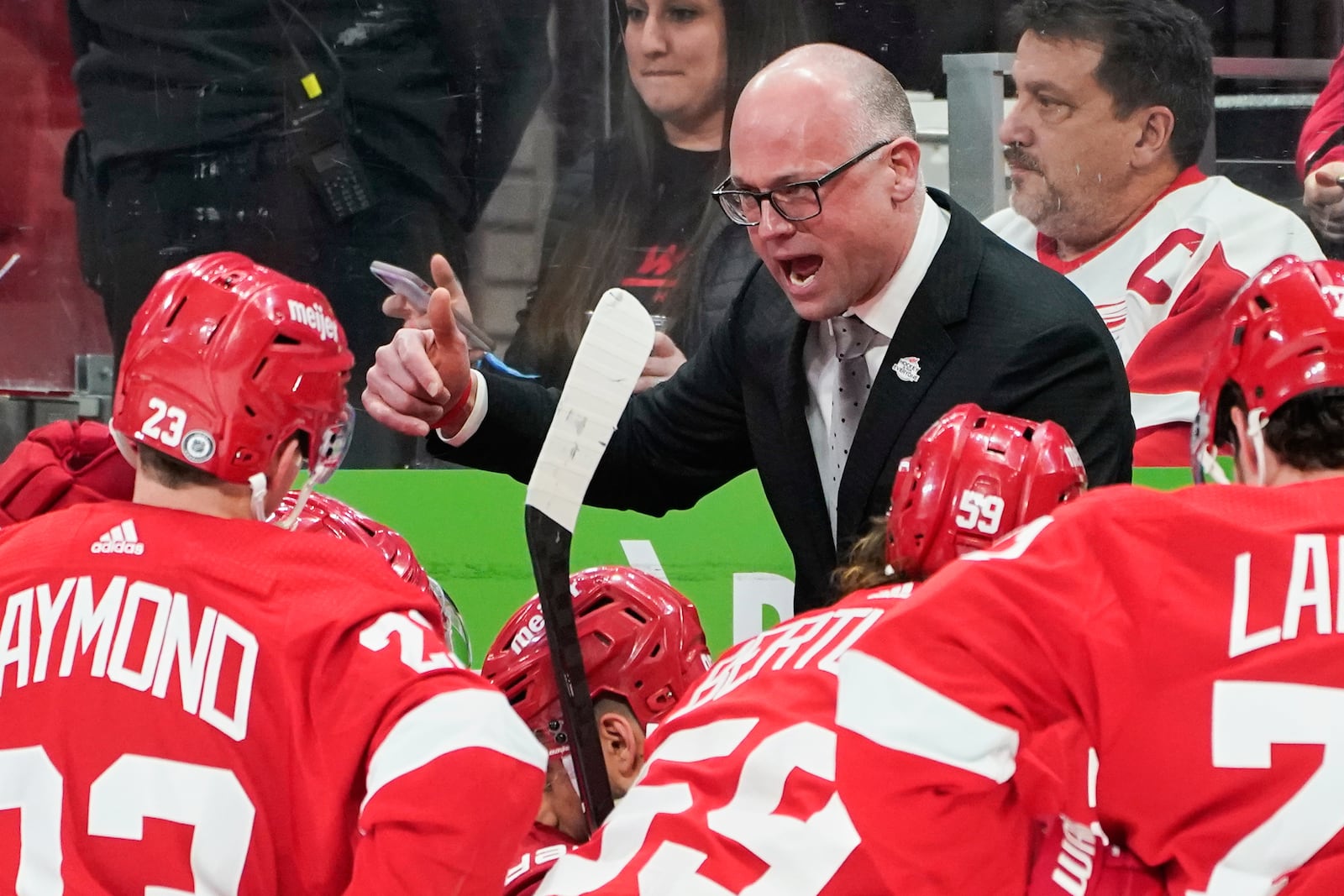FILE - Detroit Red Wings head coach Jeff Blashill talks to his team during a time out in the second period of an NHL hockey game against the Arizona Coyotes, Tuesday, March 8, 2022, in Detroit. (AP Photo/Paul Sancya, File)