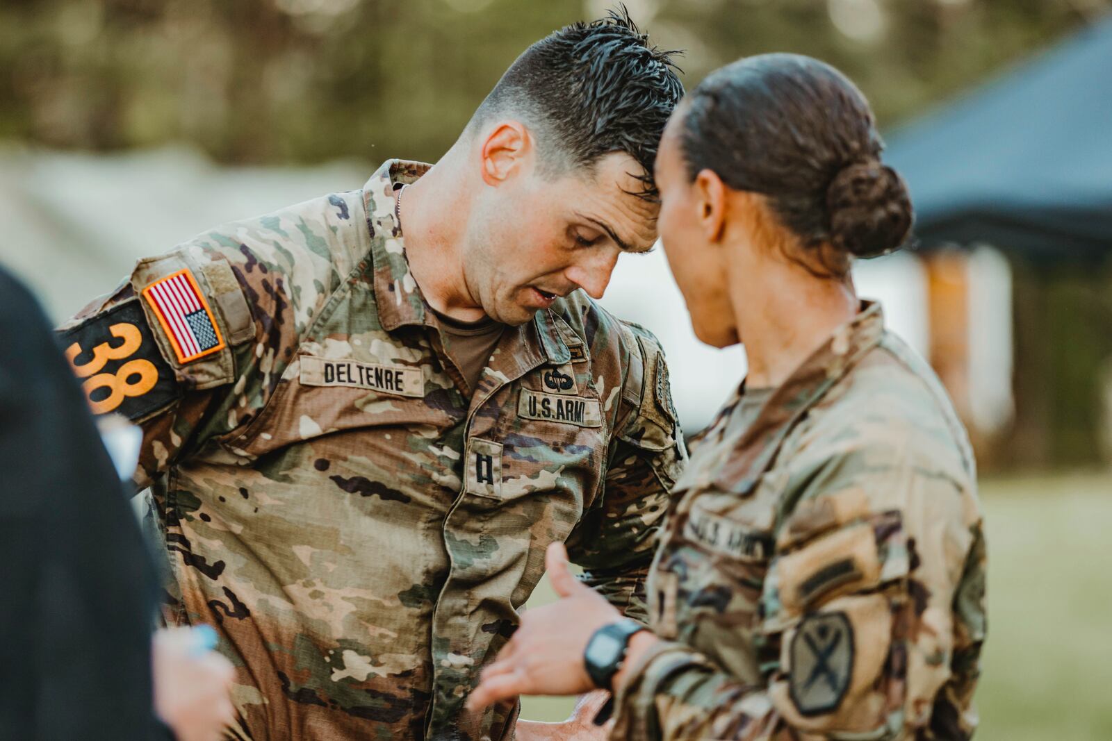 This image provided by the U.S. Air Force shows Capt. Seth Deltenre, left, and 1st Lt. Gabrielle White, from the Maneuver Center of Excellence in Fort Benning, Ga., as they compete during the Malvesti obstacle course in the 2025 Best Ranger Competition, April 11, 2025, at Camp Rogers in Fort Benning. (Patrick A. Albright/U.S. Army via AP)