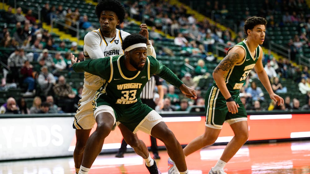 Wright State University's Michael Imariagbe boxes out a Northern Kentucky University player during their game on Saturday, Jan. 24, 2026. JEREMY MILLER / CONTRIBUTED PHOTO