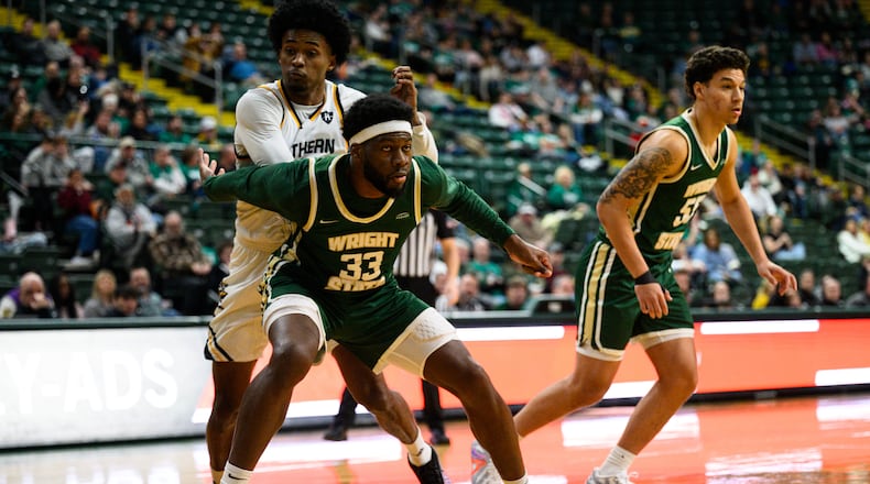 Wright State University's Michael Imariagbe boxes out a Northern Kentucky University player during their game on Saturday, Jan. 24, 2026. JEREMY MILLER / CONTRIBUTED PHOTO