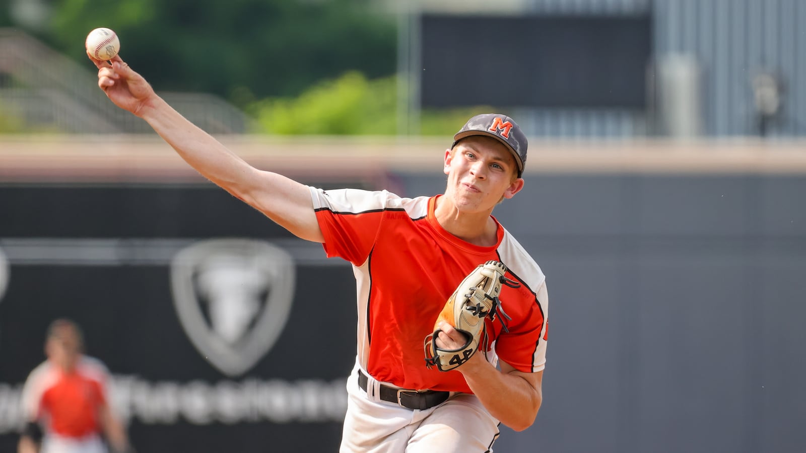 Minster High School senior Louis Magato delivers a pitch during their Division VII state semifinal game against Russia on Thursday, June 12, 2025 at Canal Park in Akron. The Wildcats won 5-3. MICHAEL COOPER / STAFF