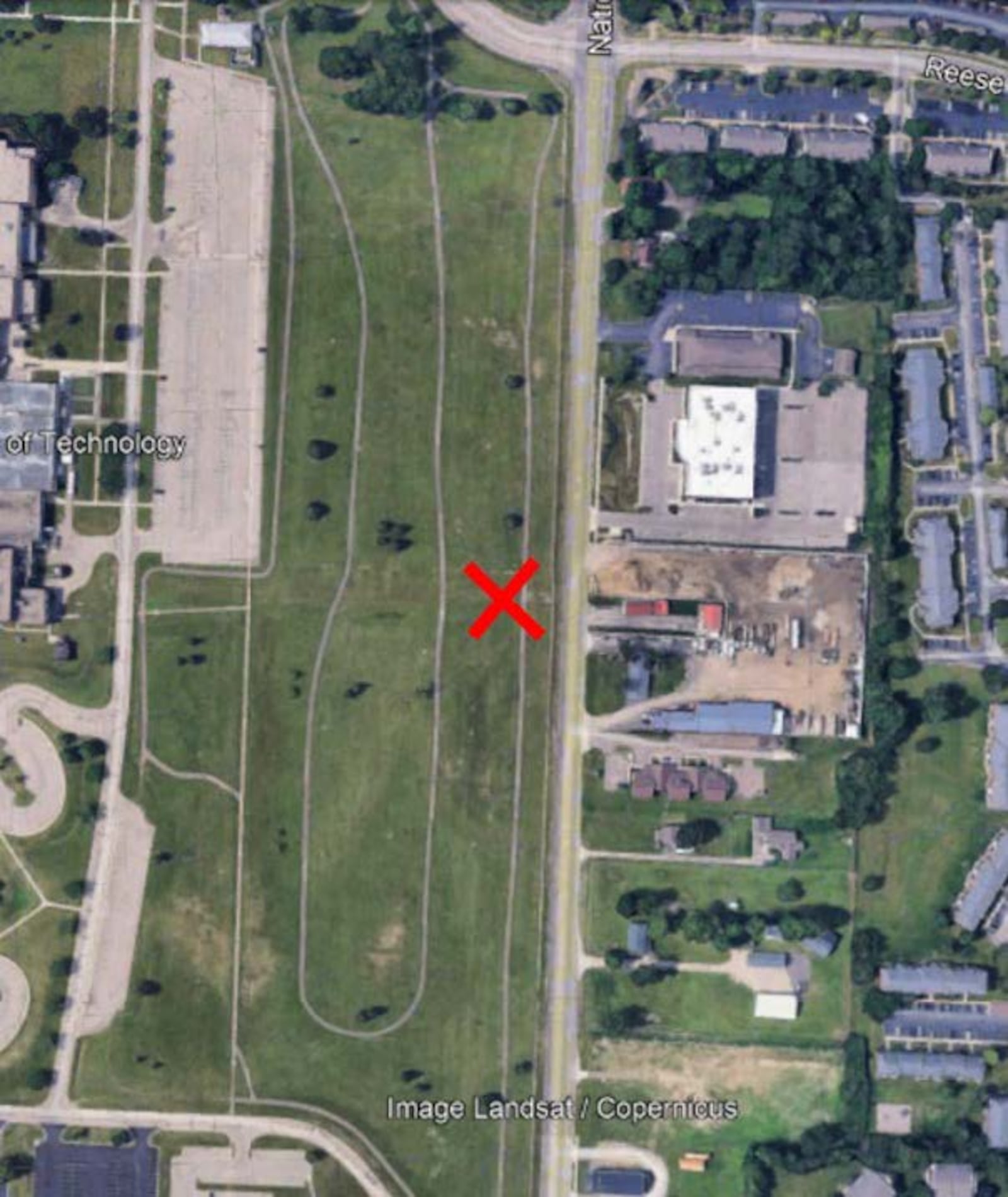 An aerial map of Wright-Patterson Air Force Base highlights the location of a new construction equipment access point off National Road. A Beavercreek developer, Synergy, is building what advocates say will be a large office park on what today is base Area B land. Air Force image.