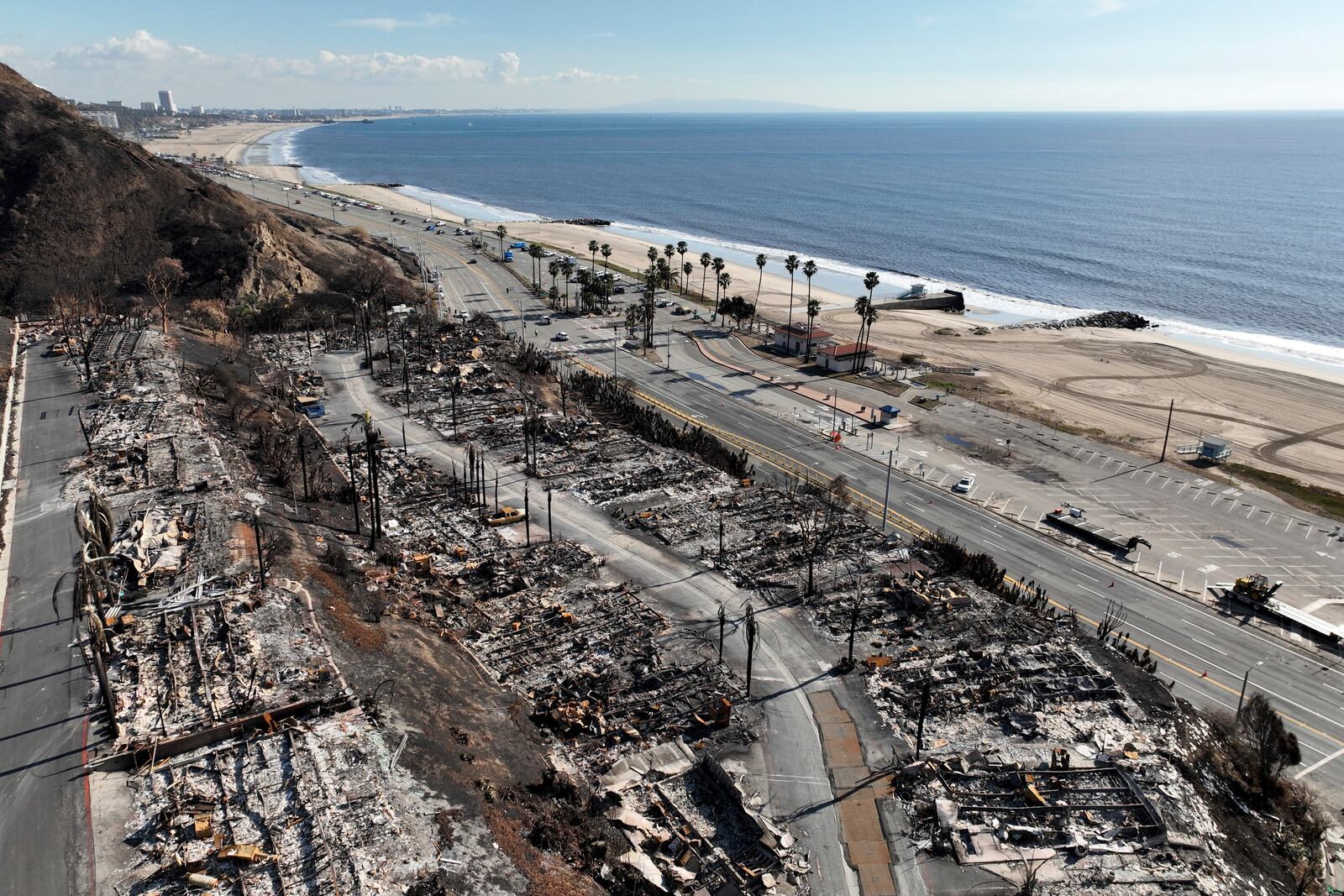 FILE - An aerial view shows the devastation left by the Palisades Fire in the Pacific Palisades section of Los Angeles, Jan. 27, 2025. (AP Photo/Jae C. Hong, File)