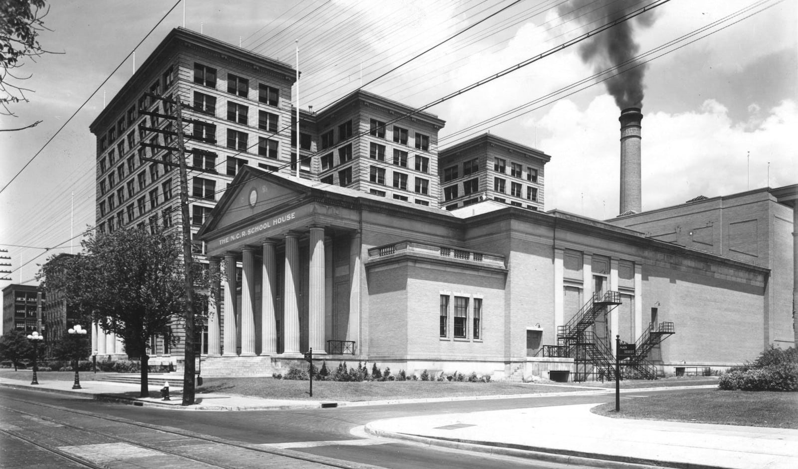 Photograph of the exterior view of the NCR Auditorium or sometimes call NCR School House.