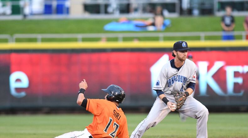 Jose Siri slides into second base against Lake County on Friday during the Dragons’ 8-3 Midwest League win at Fifth Third Field. Siri homered in the game. NICK FALZERANO / CONTRIBUTED
