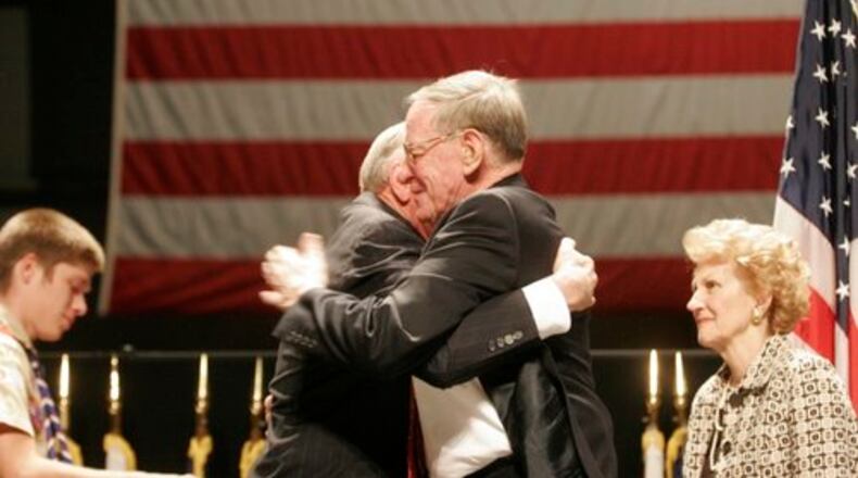 Retired Maj. Gen. Charles D. Metcalf is presented with the Distinguished Eagle Scout Award (DESA) by former astronaut and DESA recipient Neil Armstrong during a ceremony Tuesday, Oct. 27, at the National Museum of the United States Air Force where Metcalf now serves as director. Metcalf received his Eagle award on Aug. 19, 1949, as a Boy Scout in Anamosa, Iowa.